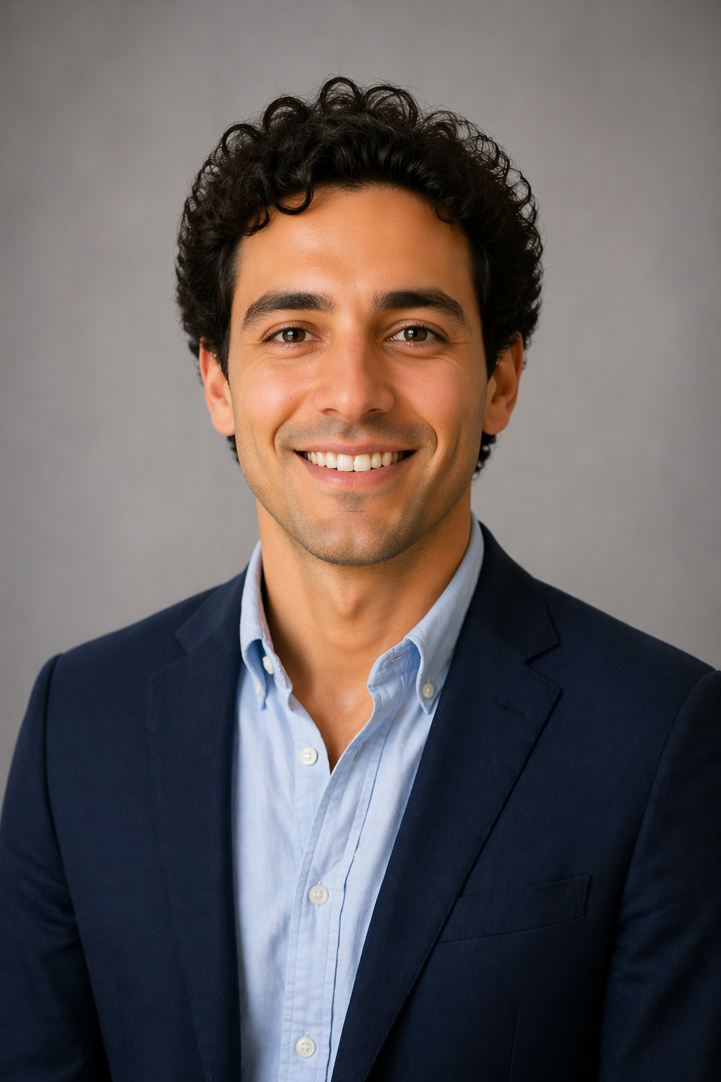 Professional business headshot of the same man